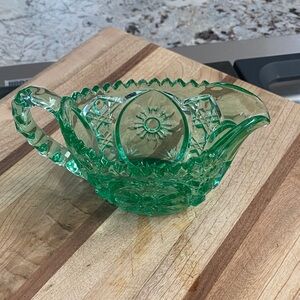 Green Glass Creamer with Intricate Design